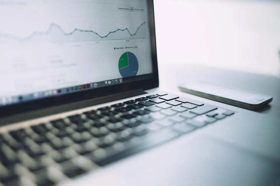 Laptop screen showing marketing analytics charts